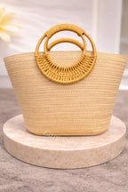 A Stylish and Casual Summer Vacation-style Large- capacity Solid-color Woven Paper Product with a Round Wooden Handle.