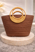 A Stylish and Casual Summer Vacation-style Large- capacity Solid-color Woven Paper Product with a Round Wooden Handle.